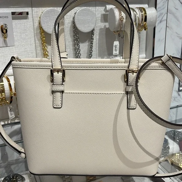 Michael Kors Jet Set Travel Extra-Small Top-Zip Tote Carryall  Bag
Light Cream - Picture 7 of 16